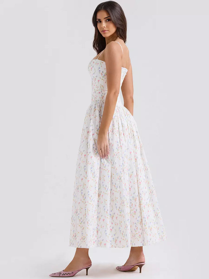 Beautiful floral print midi dress for women, featuring a flattering corset. Great for summer events.