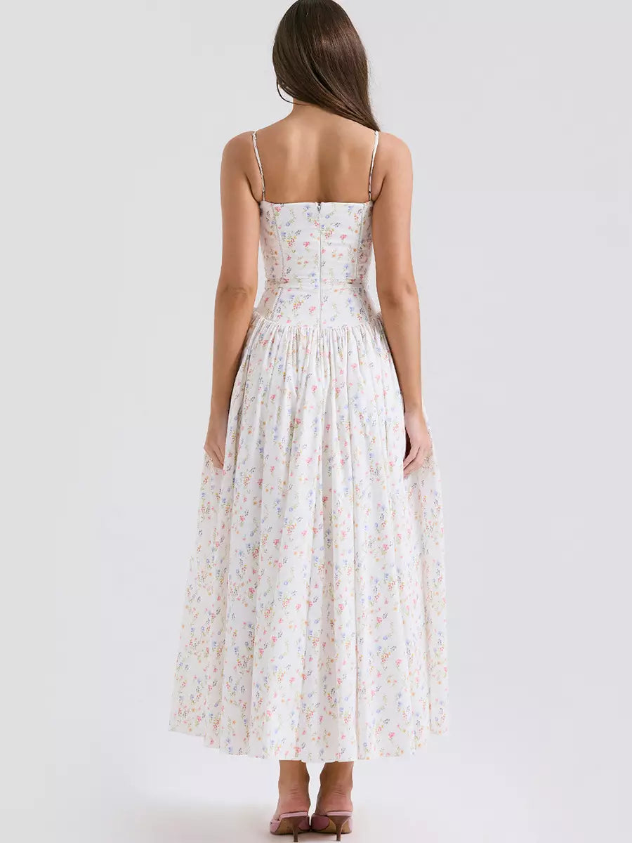 Sophisticated women's floral midi party dress. Elegant corset design, perfect for evening wear.