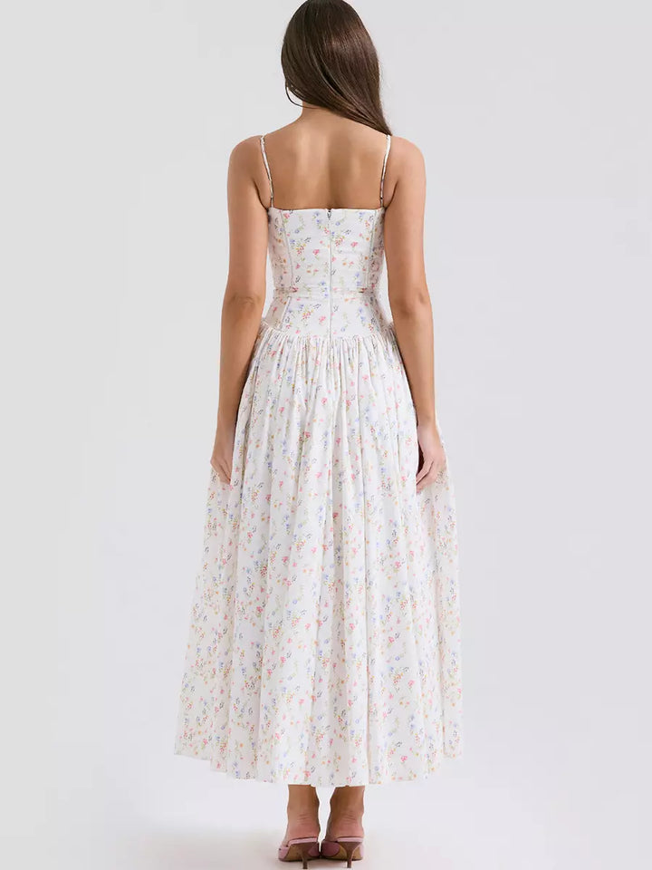 Sophisticated women's floral midi party dress. Elegant corset design, perfect for evening wear.