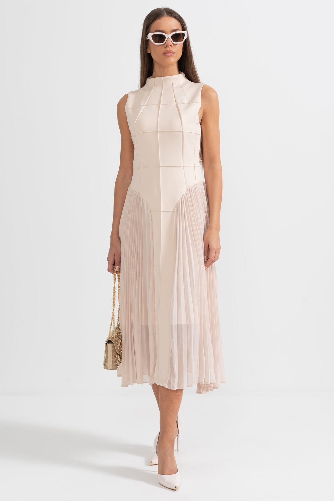 Chic beige sleeveless pleated midi dress, perfect for wedding guests, summer parties, and formal occasions.