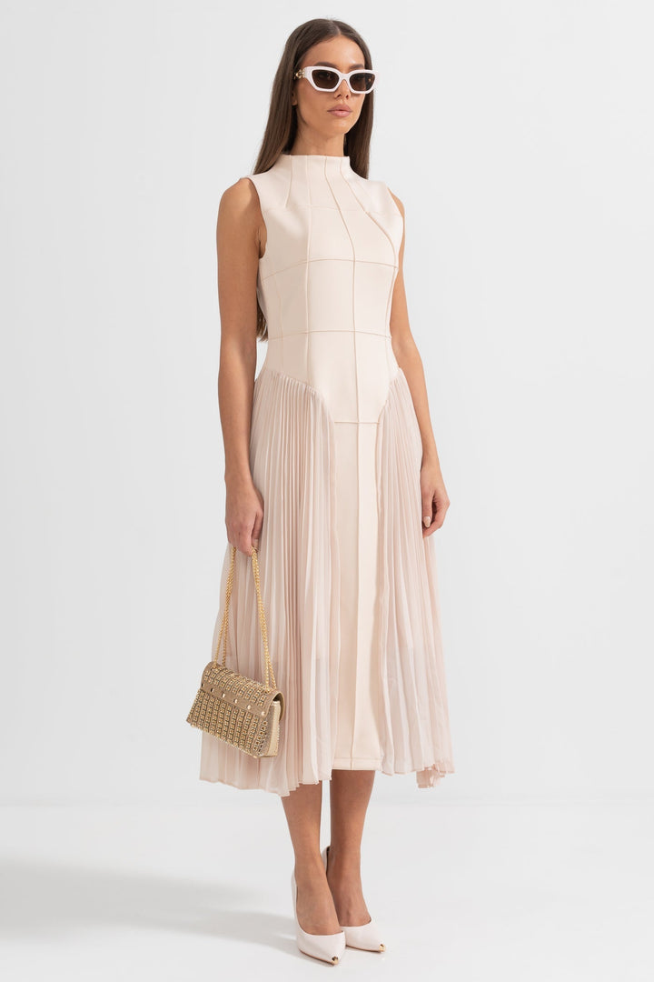 Flattering women's beige pleated midi dress with sleeveless design, an elegant choice for cocktail and evening events.