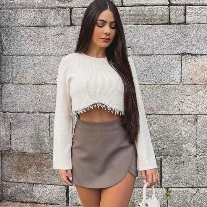 Women's high waist asymmetric mini skirt, a chic and modern fashion staple for versatile styling.