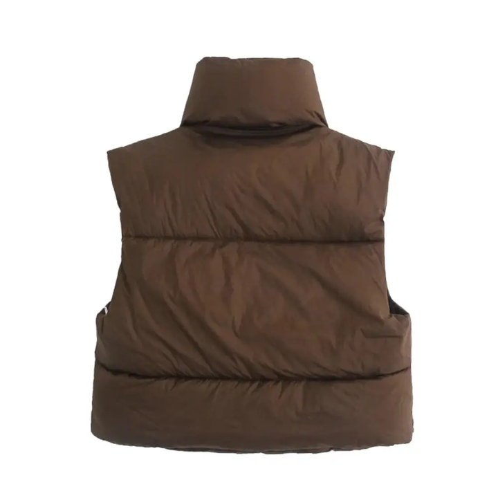 Stylish women's cropped quilted puffer vest, perfect for transitional weather and casual outerwear.
