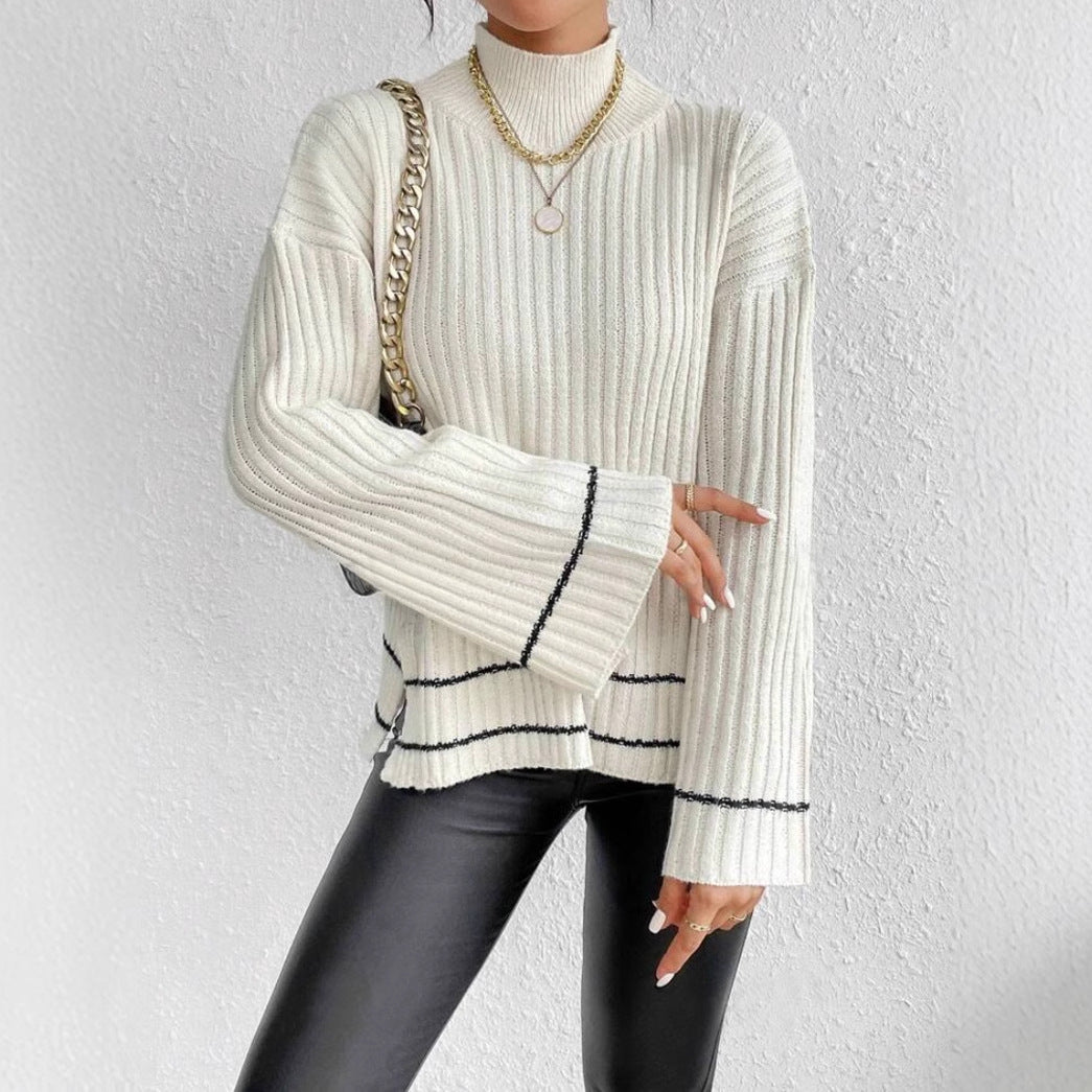 Versatile women's pullover jumper with chic contrast stripes, mock neck & trendy flared sleeves. Autumn wear.