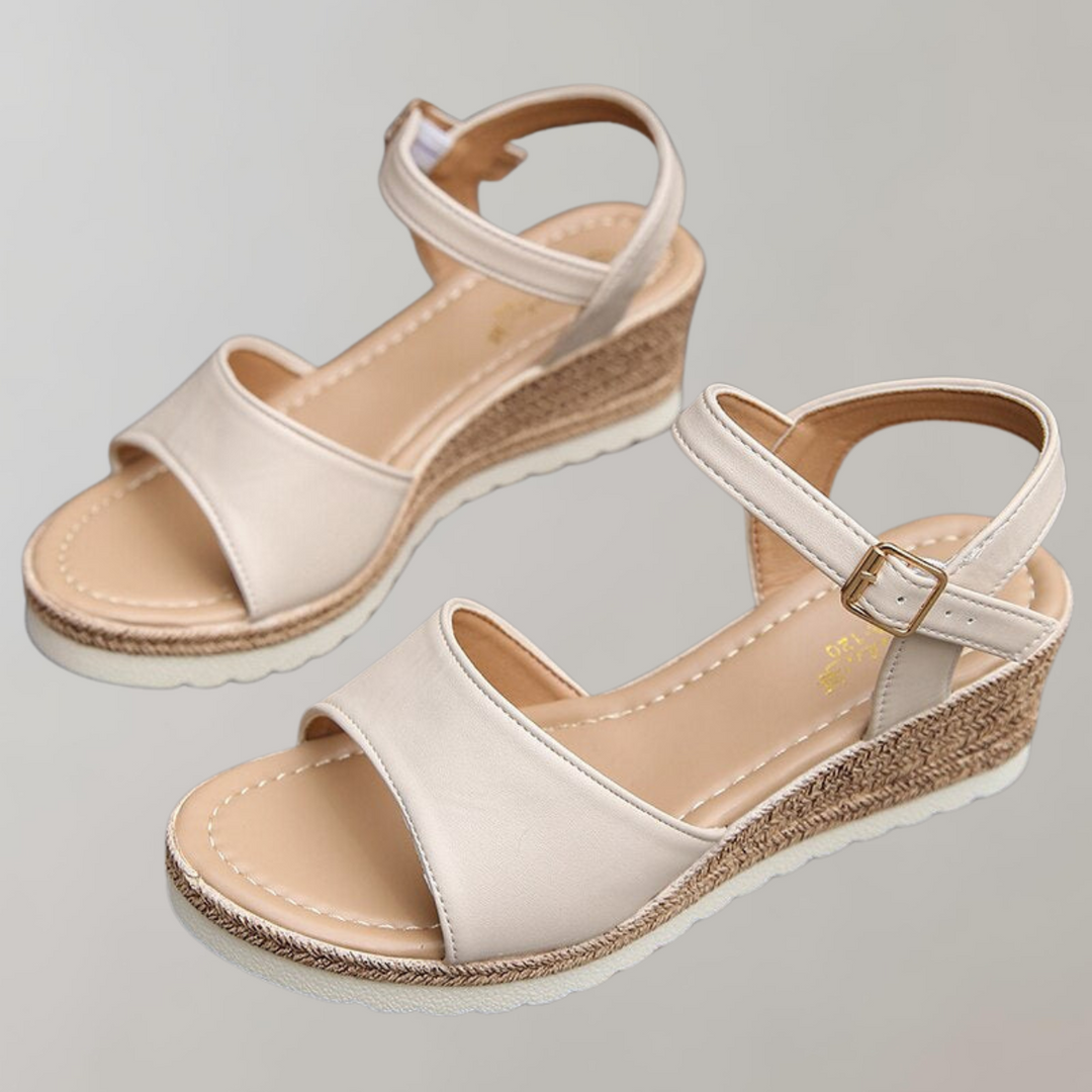 Stylish women's platform ankle strap sandals, essential footwear for comfortable summer fashion.