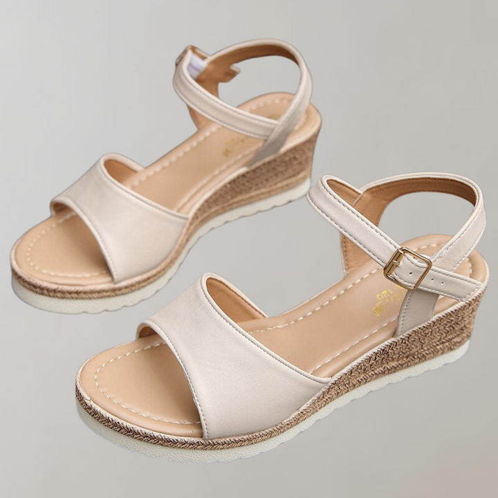 Stylish women's platform ankle strap sandals, essential footwear for comfortable summer fashion.