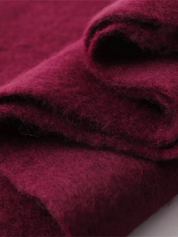 Women's burgundy oversized tassel scarf, a cozy & warm winter wrap accessory for stylish comfort.