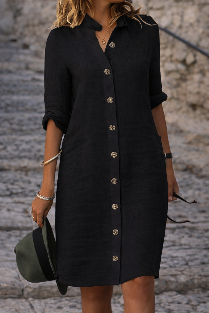 Stylish women's button-front shirt dress featuring half sleeves and a versatile design, great for casual summer days.