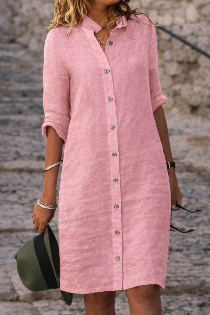 Elegant women's shirt dress, button-front, with half sleeves. A versatile mini dress for casual summer or day wear.