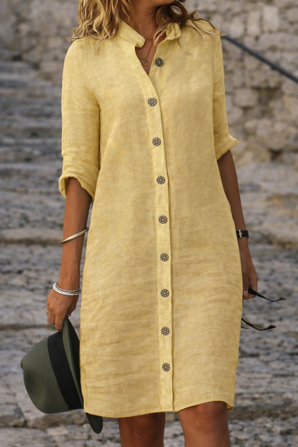 Modern women's half-sleeve button-front shirt dress. This versatile casual mini dress is perfect for summer days.