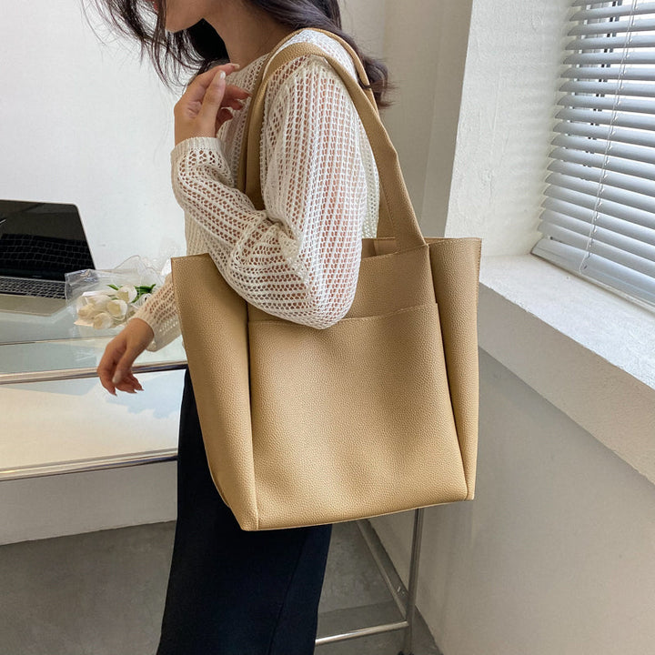 Elegant women's pebbled "Work to Weekend" large shoulder tote bag. Versatile for business, office, and everyday carry.