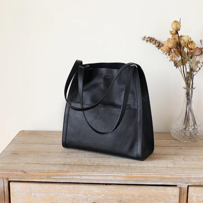Spacious brown women's large shoulder tote bag, perfect for work, travel, and everyday essentials.