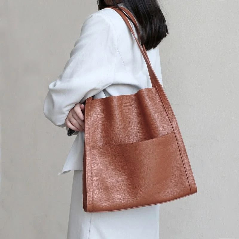 Brown women's large shoulder tote bag for work and travel, versatile everyday carryall.