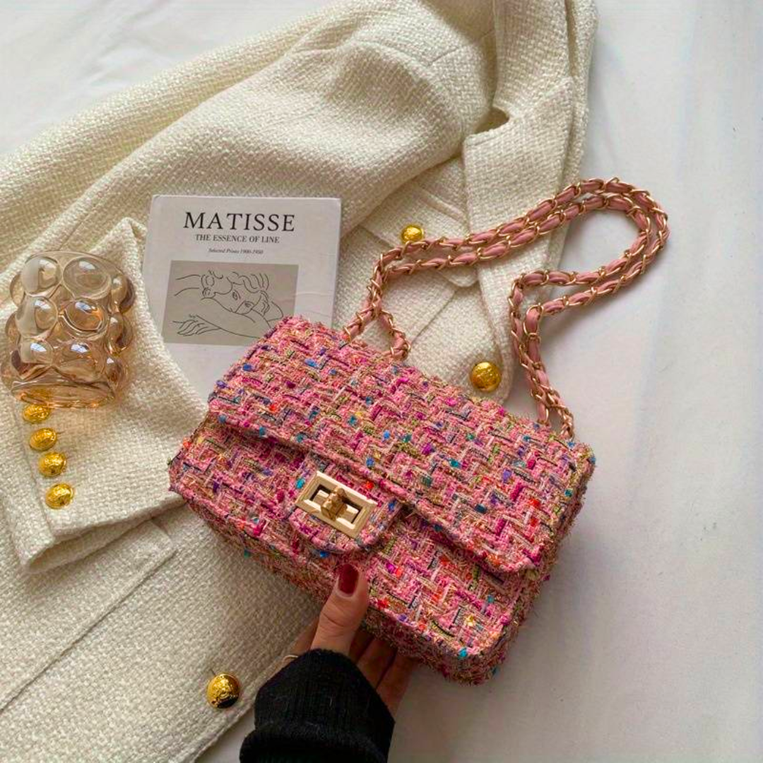 Elegant women's structured bouclé shoulder bag with chic gold chain strap, perfect for evening or daily wear.