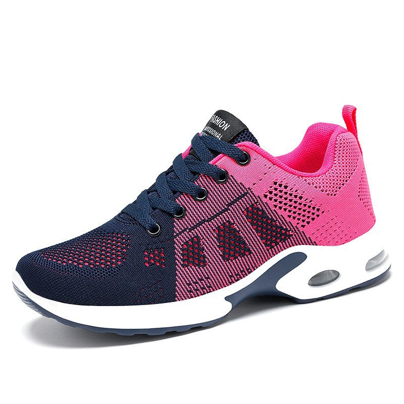 Purple women's lightweight everyday comfort sneakers, great for walking, jogging, or casual athletic style.