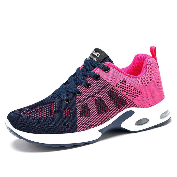 Purple women's lightweight everyday comfort sneakers, great for walking, jogging, or casual athletic style.