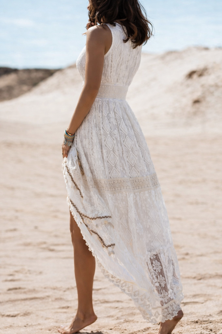 Stylish women's boho maxi dress, sleeveless, v-neck design for a casual beach summer look & holiday fashion.
