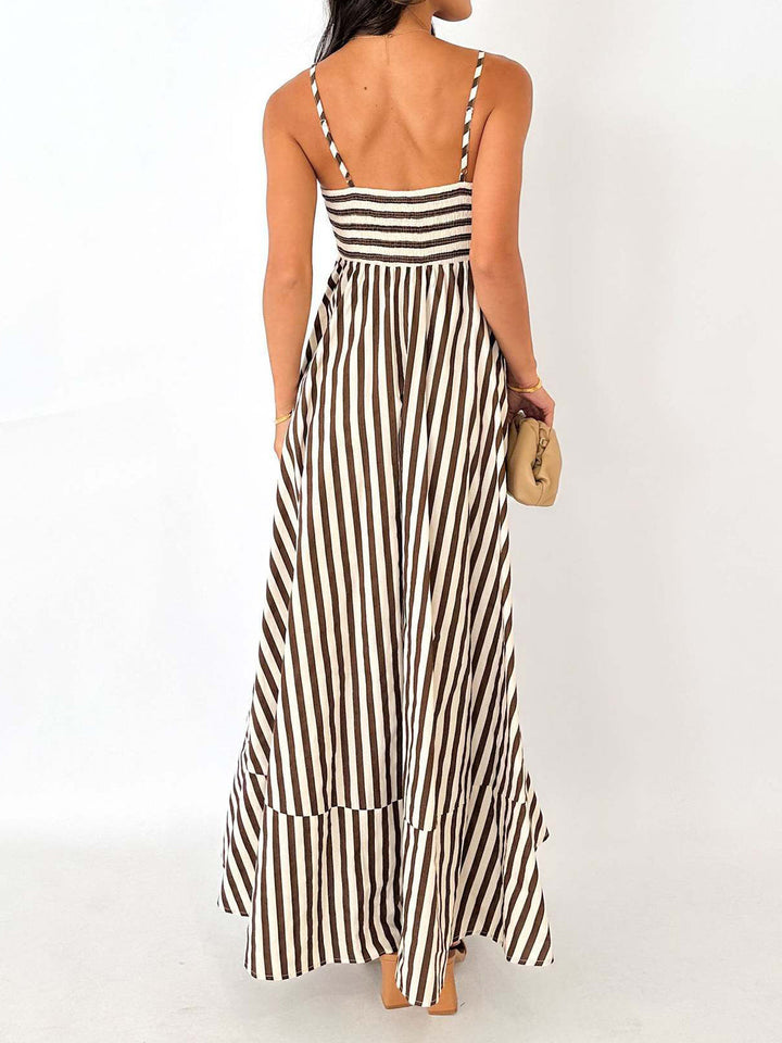 Flowing A-line women's striped maxi sundress, sleeveless design for casual summer comfort & stylish beach vacation.