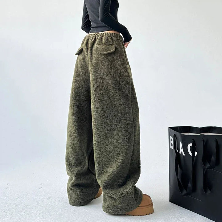 Back view of women's high waist wide leg sweatpants, highlighting the loose, baggy fit and comfortable design.