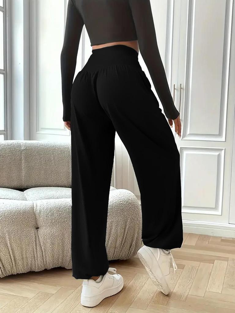 Stylish women's high waist baggy sweatpants with a relaxed fit, ideal for athleisure & everyday fashion.