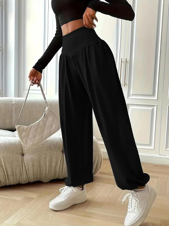 Versatile women's black high waist baggy sweatpants, great for loungewear, athleisure, or casual everyday style.