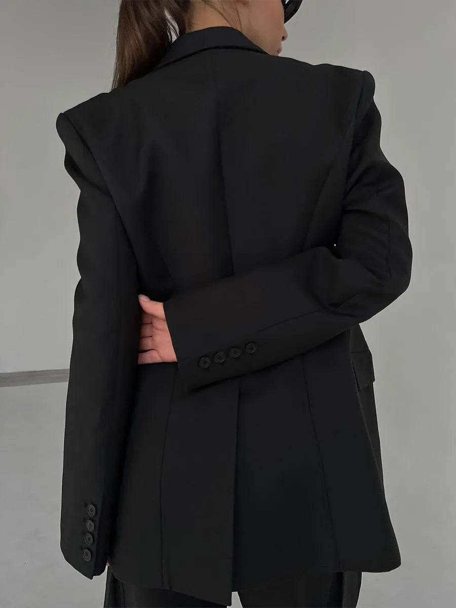 Female fashion tailored blazer, perfect for business casual and elevating any office wear outfit. Power dressing.