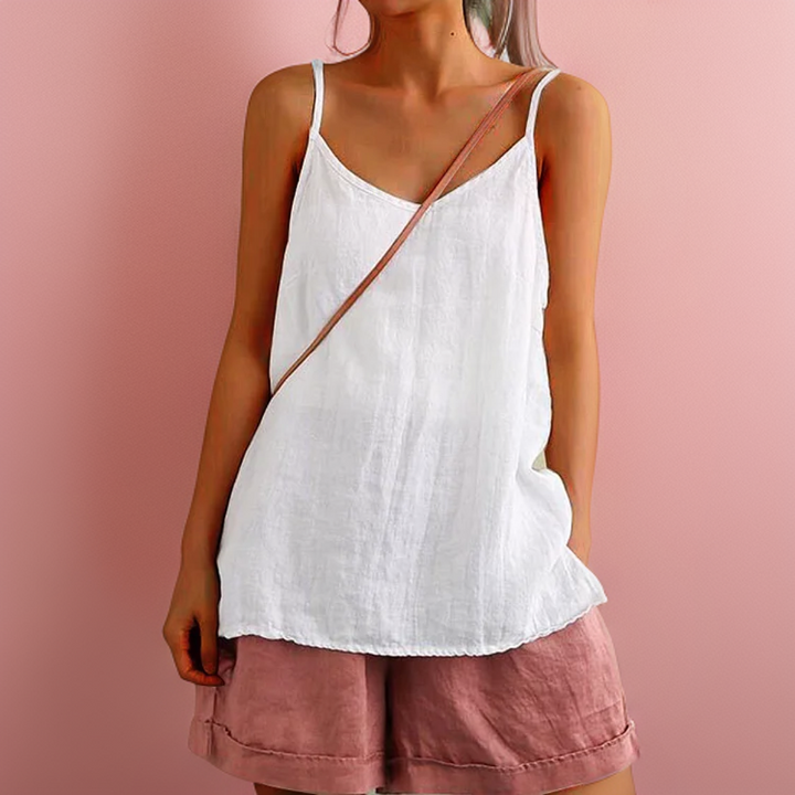 Chic women's sleeveless round-neck tank top in a relaxed fit. Ideal for summer layering or casual outfits.