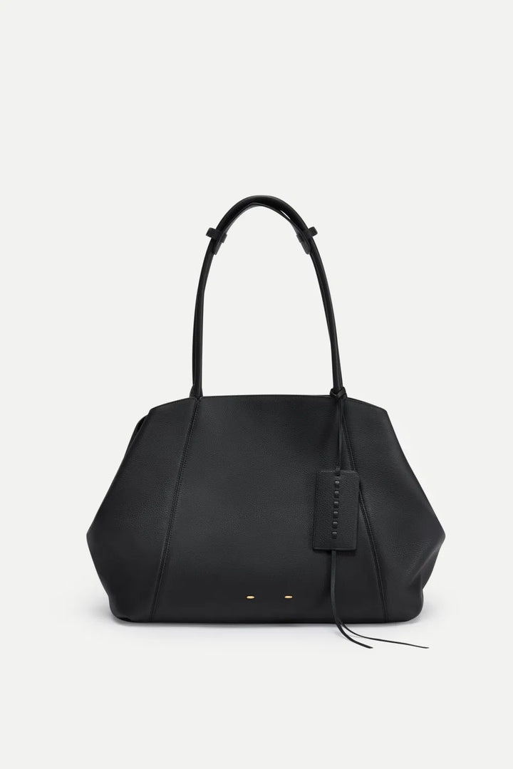 Women's brown travel tote bag, a stylish and practical shoulder bag for any journey.
