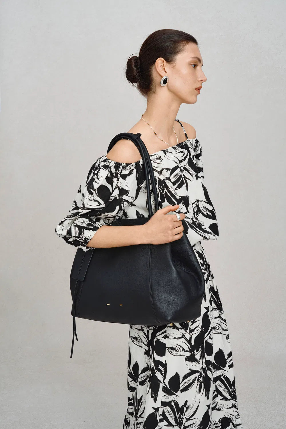 Spacious women's black everyday tote, perfect for work, errands, or a weekend trip.