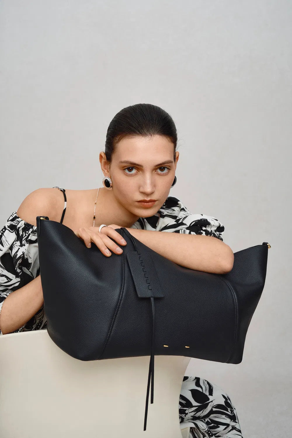 Brown women's travel tote, a large and durable shoulder bag for all your adventures.