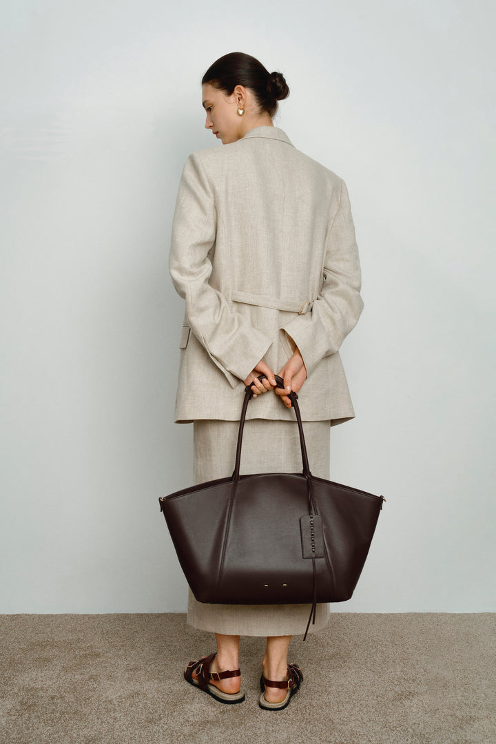 Fashionable brown women's shoulder bag, ideal for daily essentials, work & versatile use.