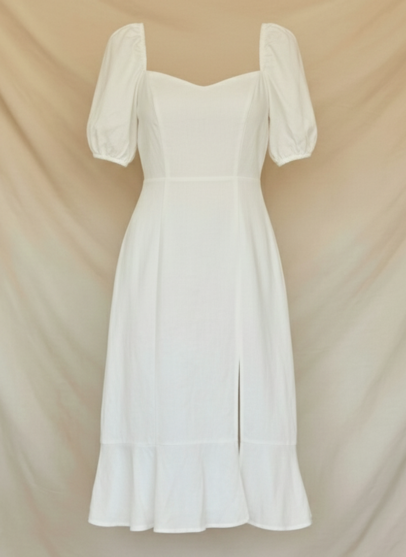 Stylish women's wedding guest midi dress with puff sleeves. A chic formal dress for special occasions.