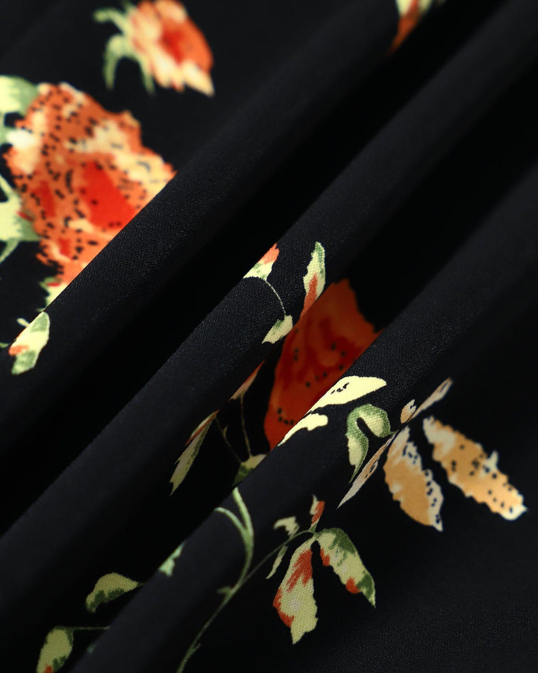 Chic women's V-neck black floral midi dress, perfect as a wedding guest or special occasion summer party dress.
