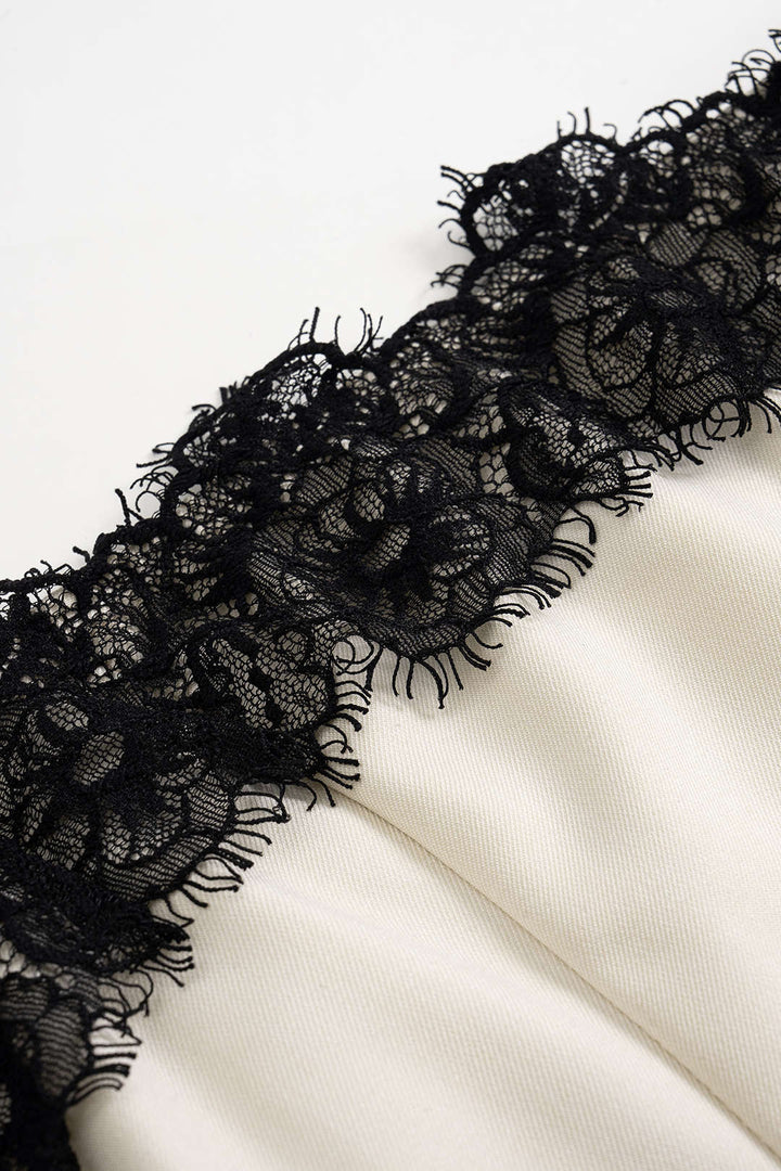 Elegant women's white midi dress with sophisticated black lace accents, a versatile choice for evening wear.