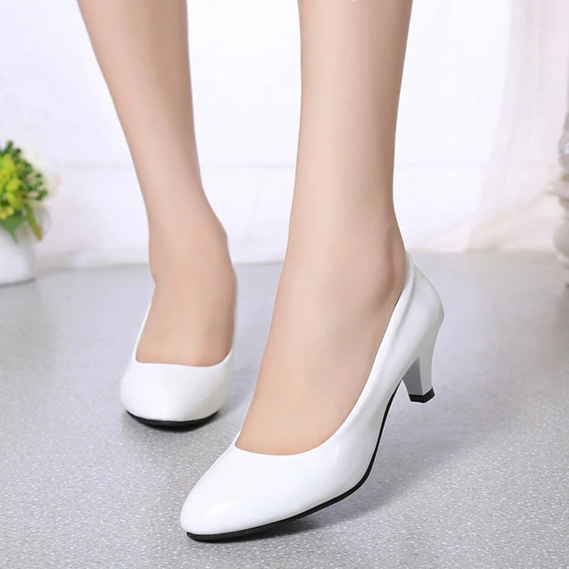 Elegant women's classic white pump heels with pointed toe, perfect for office, weddings & formal events.