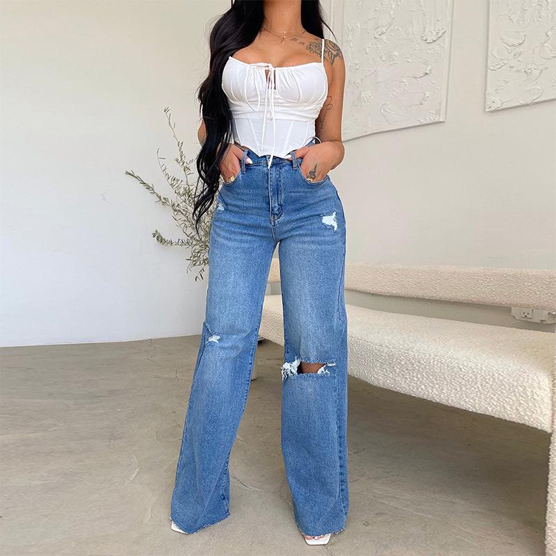 Women's high-rise wide-leg jeans with stylish ripped knees & trendy raw hem. Perfect casual denim pants.