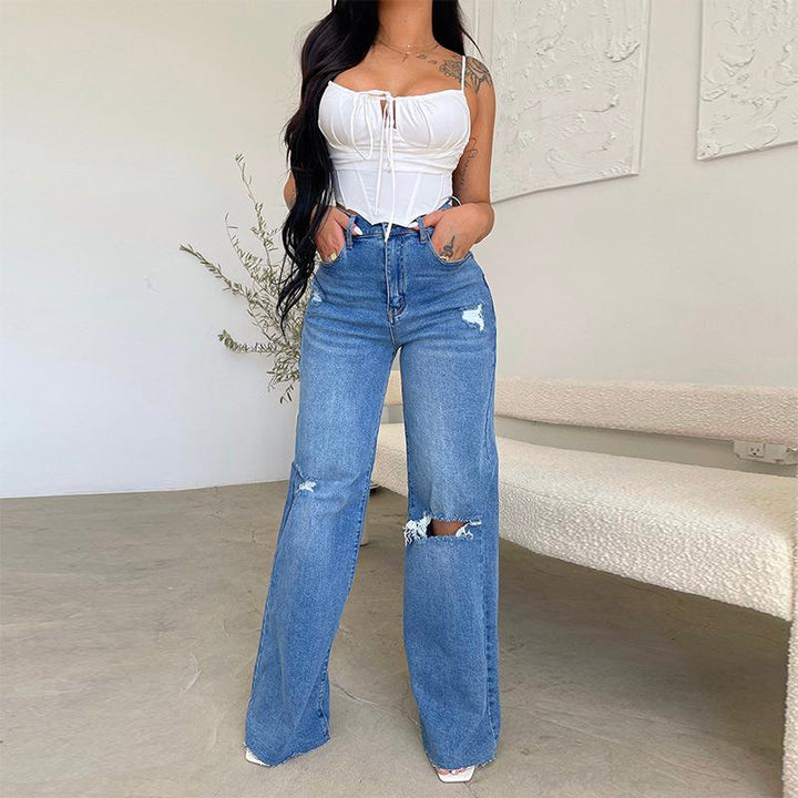 Women's high-rise wide-leg jeans with stylish ripped knees & trendy raw hem. Perfect casual denim pants.