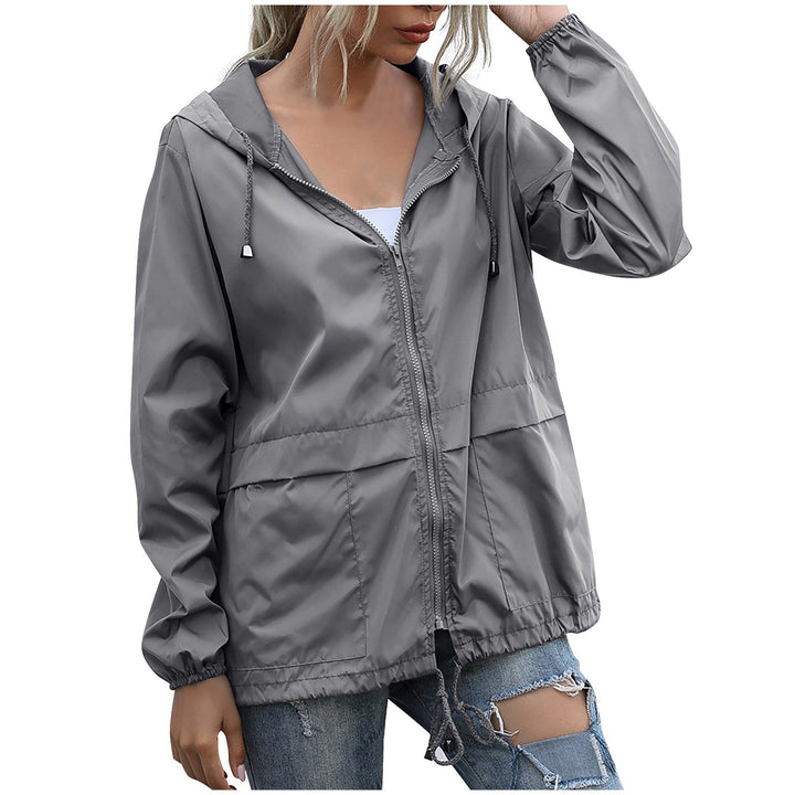 Stylish women's hooded windbreaker, a casual zip jacket for spring and fall. Essential lightweight everyday outerwear.