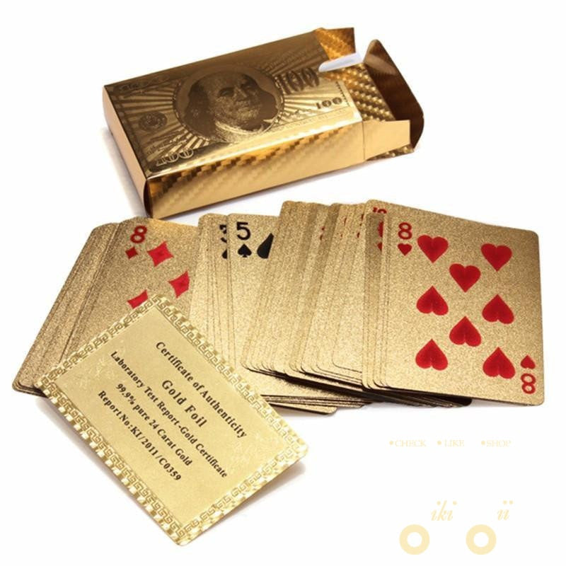 Fanned out deck of shiny 24K gold-plated playing cards, showcasing the premium collectible card deck.