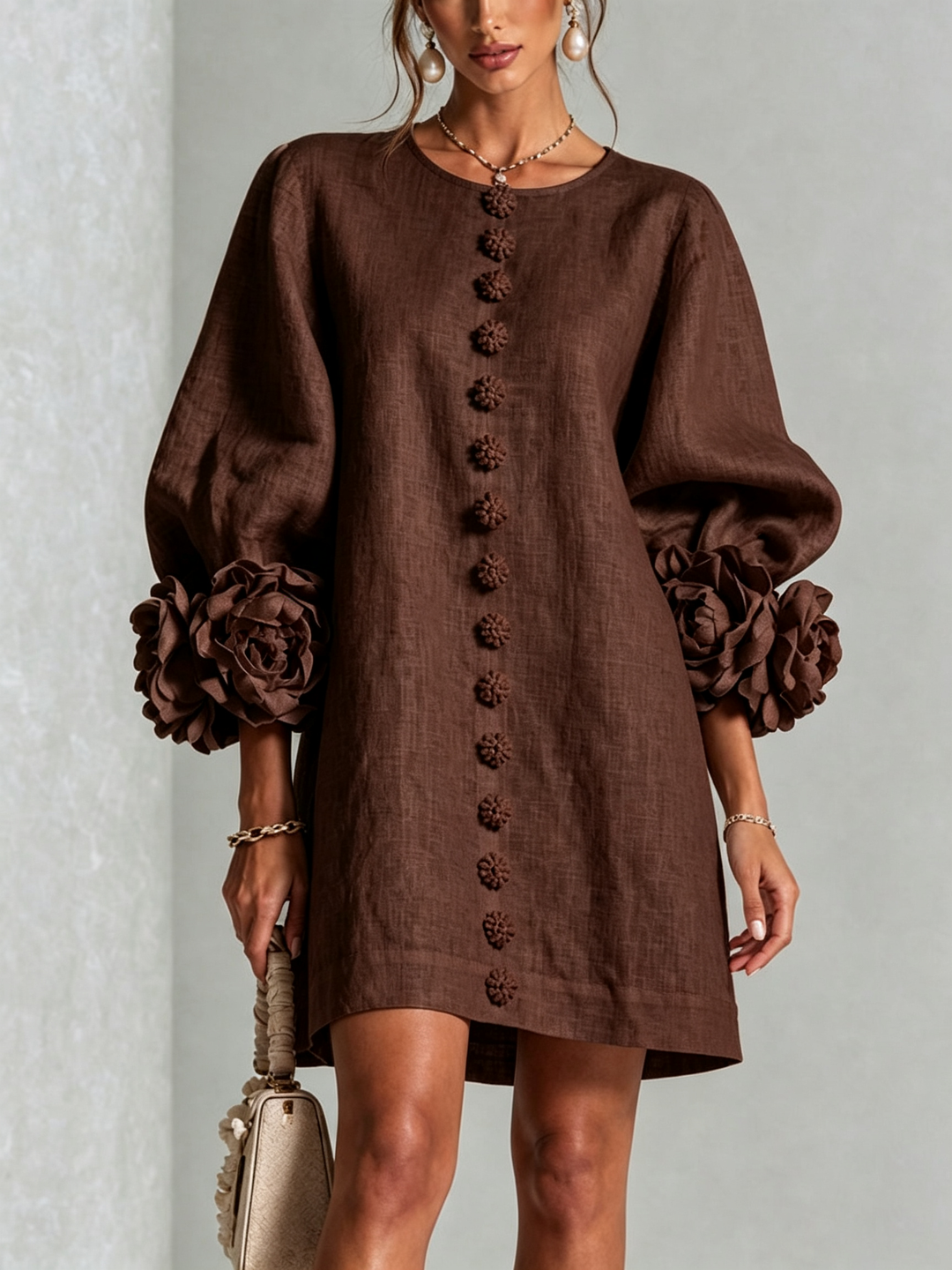 Chic women's puff sleeve mini dress, shift style, button front, effortless for summer.