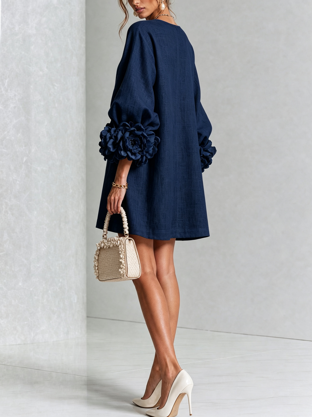 Effortless women's puff sleeve mini shift dress, great for summer casual looks.