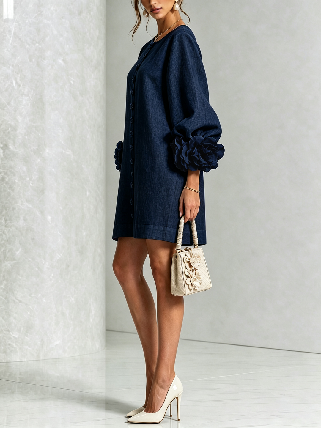 Women's mini dress with puff sleeves, a shift silhouette, & button front, chic & comfy.