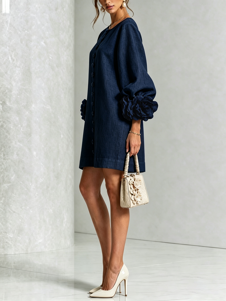Women's mini dress with puff sleeves, a shift silhouette, & button front, chic & comfy.