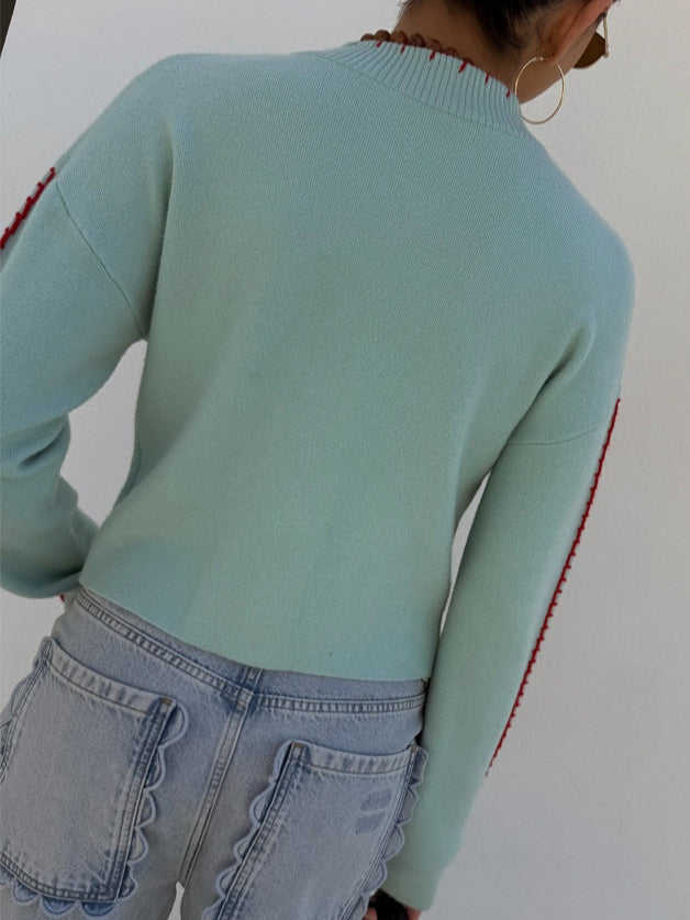 Unique women's long-sleeve button-front cardigan, featuring a playful octopus graphic design.