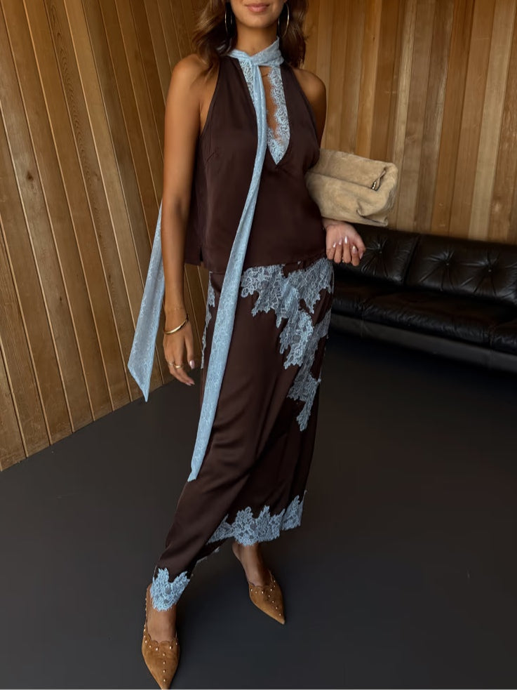 Fashionable women's brown two-piece skirt set with an elegant lace panel top, perfect for a coordinated look.
