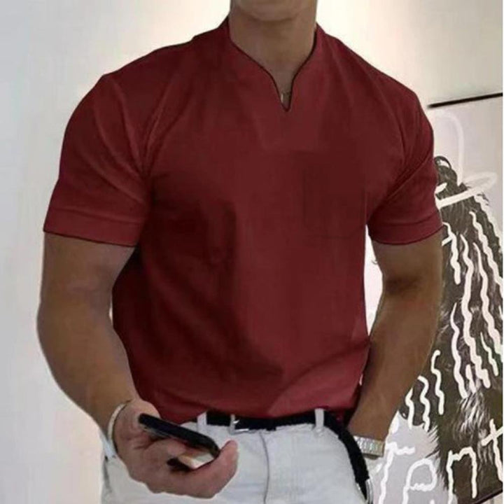 Elegant navy men's polo shirt for sophisticated everyday wear. Comfortable short sleeve design.