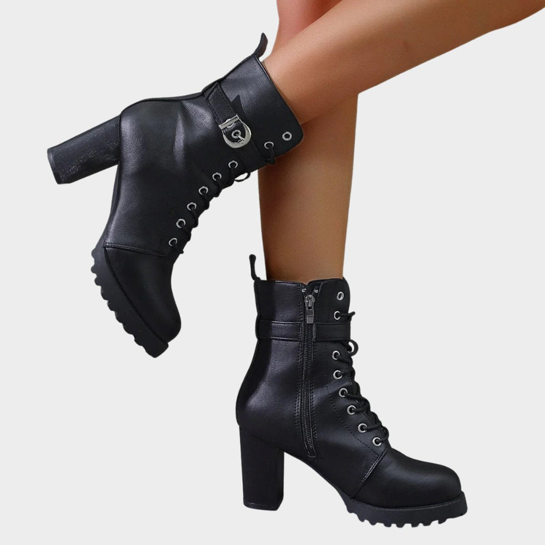 Black women's lace-up combat boots, chunky block heel. Great for fall, winter, and everyday edgy style.