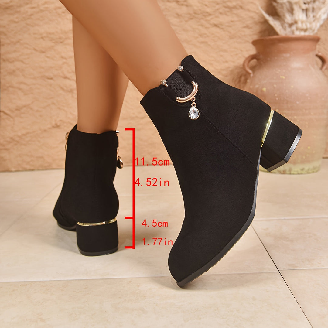 Elegant brown women's Chelsea boots with a modern block heel, ideal for casual and stylish fall outfits.