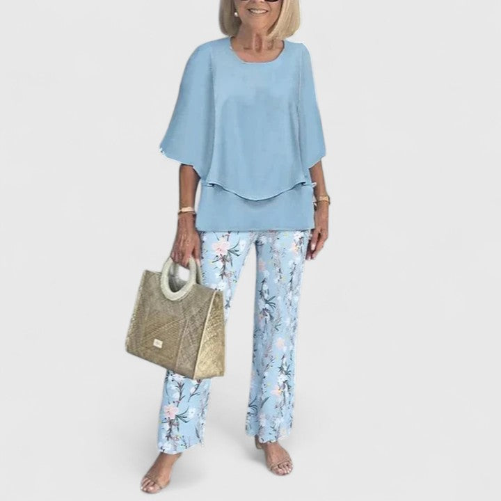 Women's versatile two-piece co-ord set. Elegant top and trousers, ideal for summer fashion & relaxed wear.