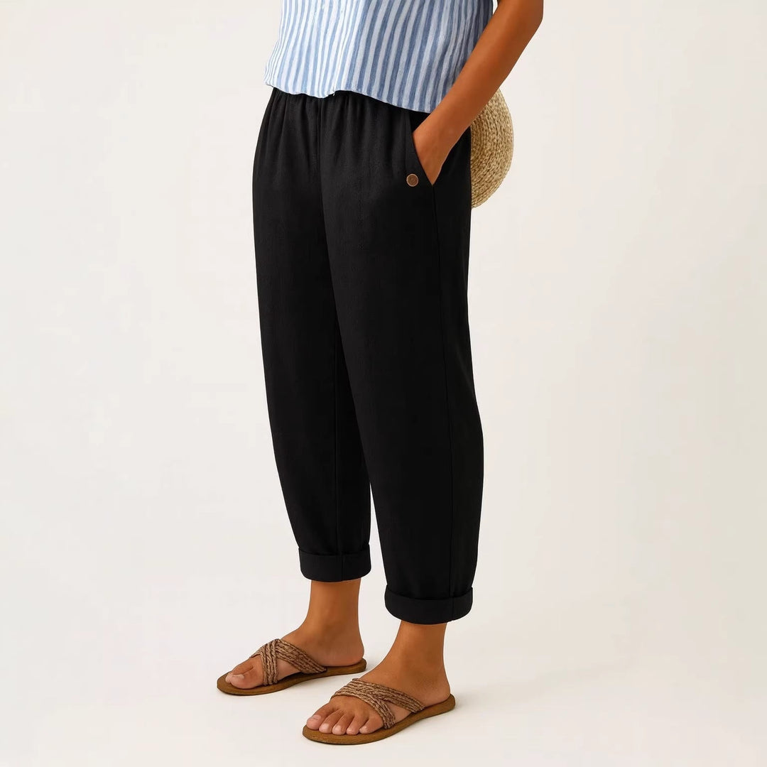 Stylish women's casual pants showcasing eye-catching 3D buttons, ideal for autumn fashion bottoms.